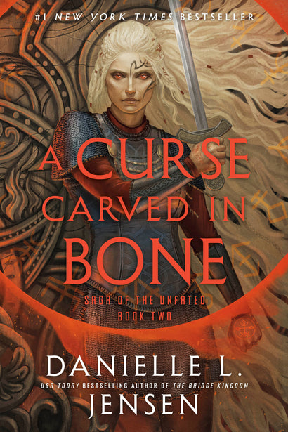 A CURSE CARVED IN BONE TRADE PAPERBACK